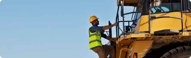 construction worker on a vehicle