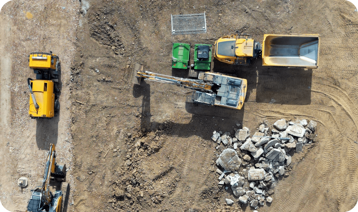 top down view of construction vehicles on-site