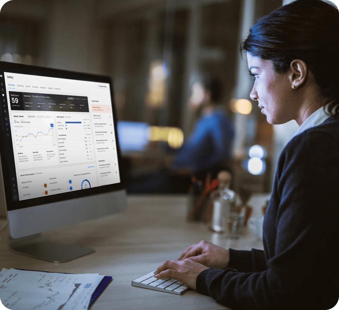 woman in front of computer tracking expenses