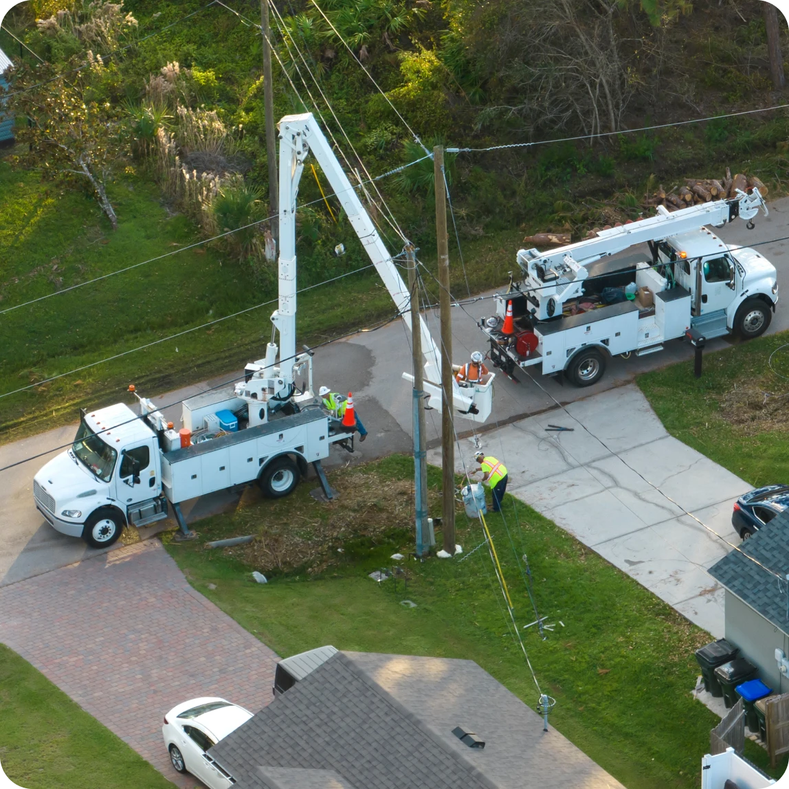 public utility bucket trucks servicing power lines