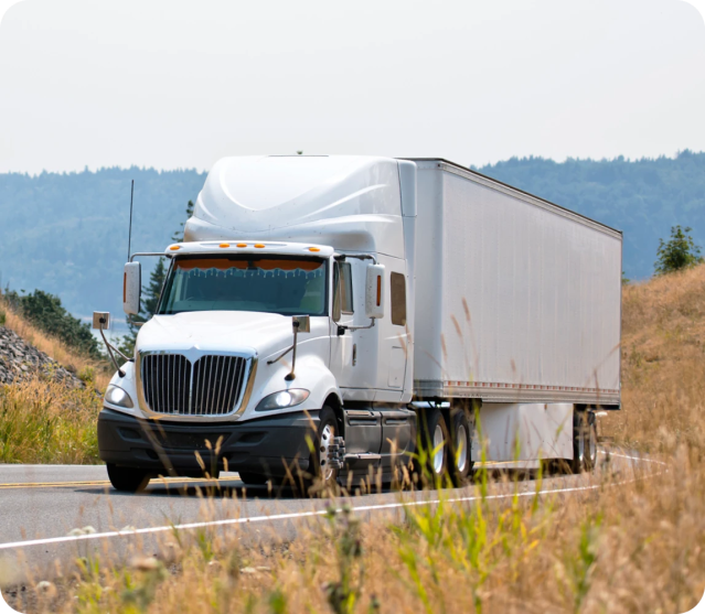 semi-truck driving through rural america