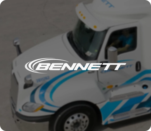 bennett logo with truck in background