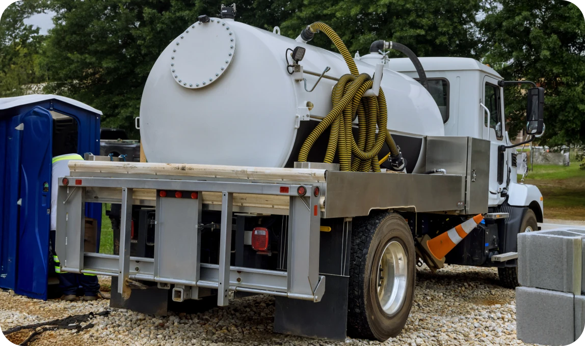 image of a truck pulling liquid (waste)