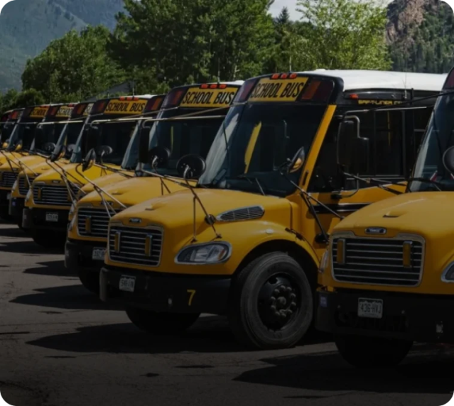 aspen school district school buses with text overlay using motive platform for maintenance and telematics combined