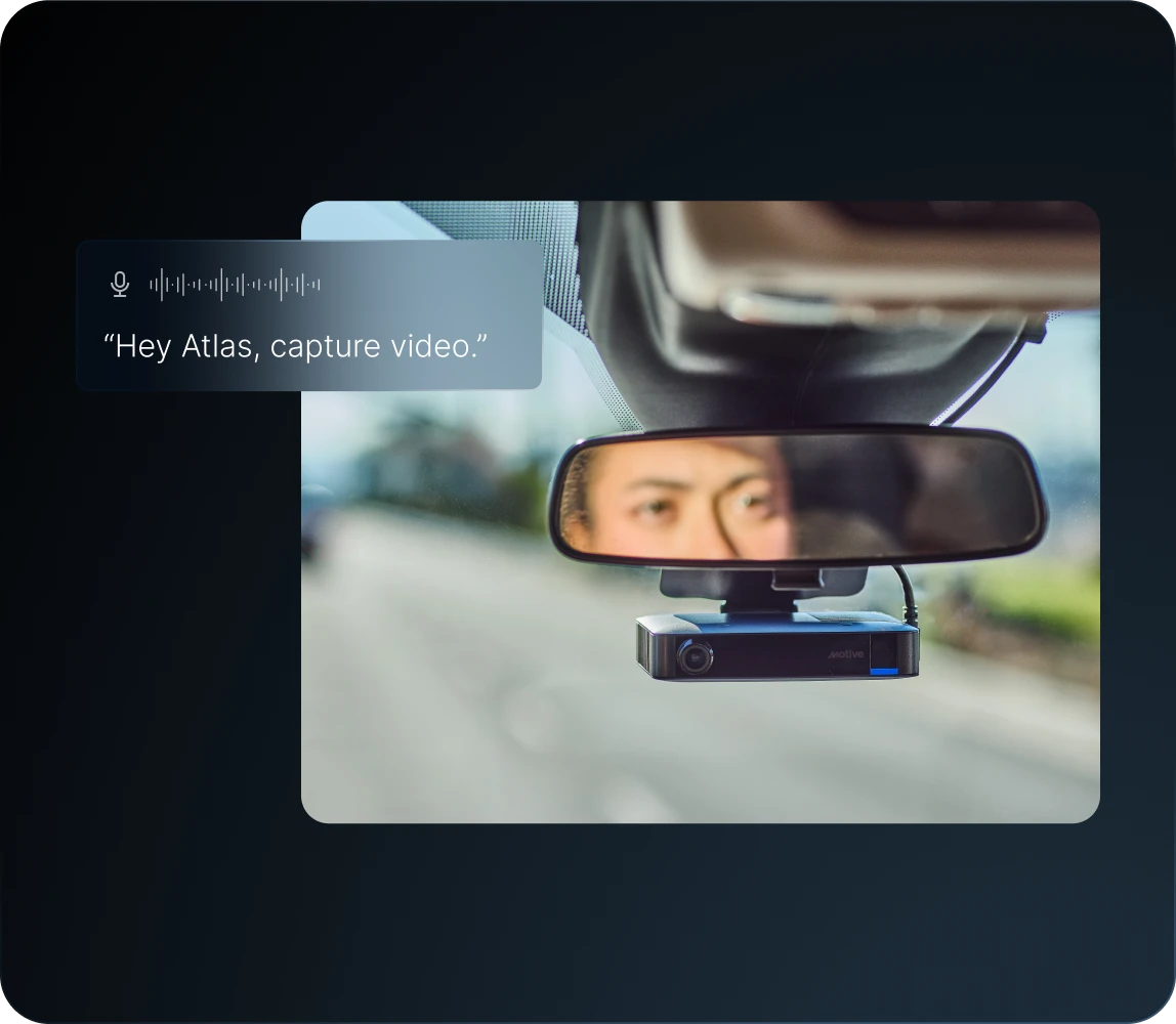 Driver initiating voice command “Hey Atlas, capture video," triggering the Motive Dashcam Plus to begin recording video.