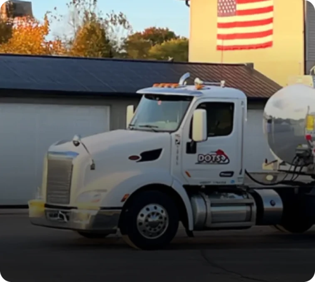 duncan oil truck with text overlay showing 50% vehicle downtime improvement with motive fleet maintenance