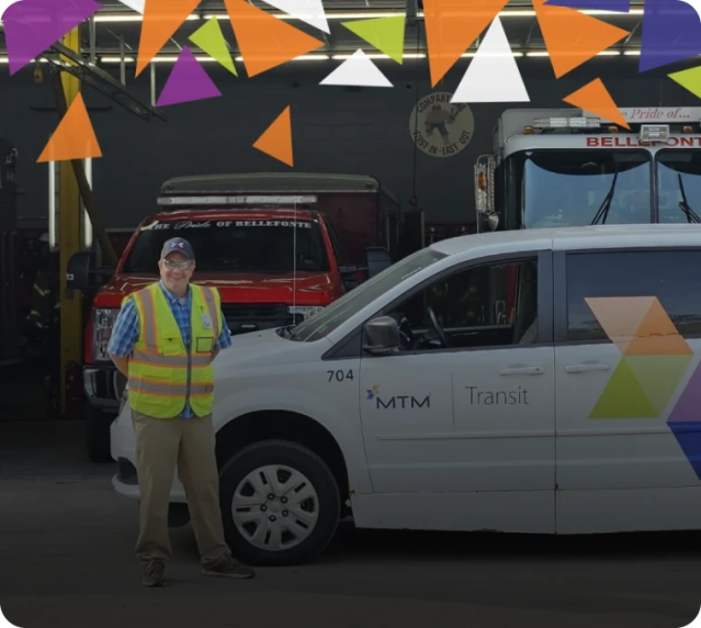 MTM Transit vehicle and worker with text overlay showing $30,000 saved in repair costs in first two weeks with fleet maintenance software