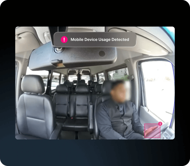 AI Dashcam Plus driver-facing video feed triggering a “Cell Phone Usage Detected” alert.